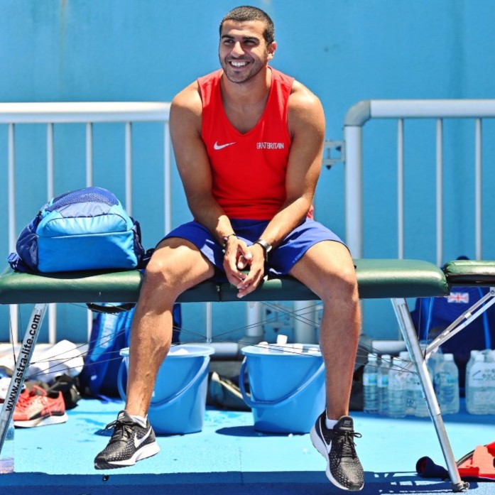 adam gemili sat on bench traing